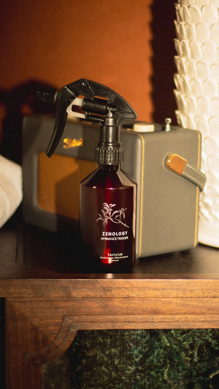 A brown spray bottle labeled