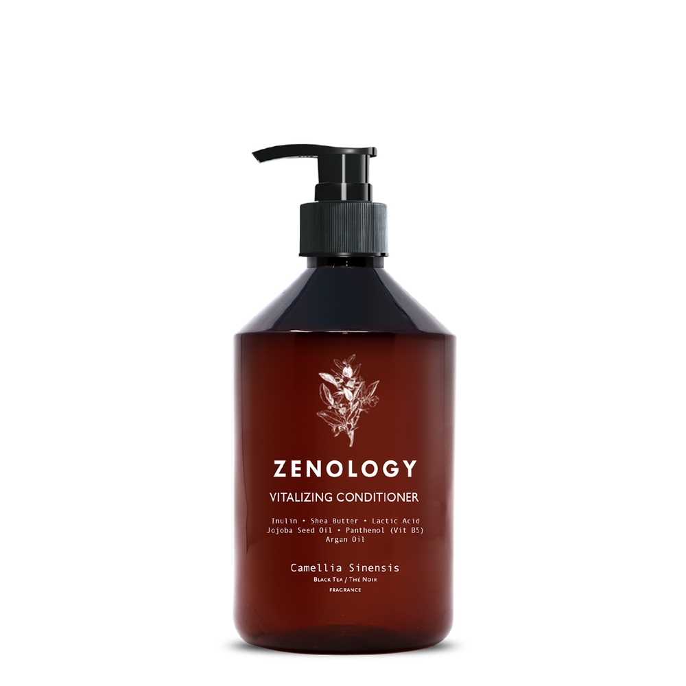 A brown pump bottle labeled Zenology Vitalizing Conditioner Camellia Sinensis featuring an unique botanical illustration and a black pump.