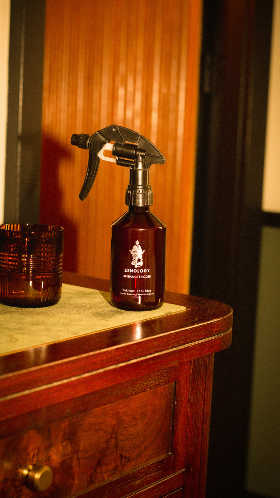 A brown spray bottle labeled