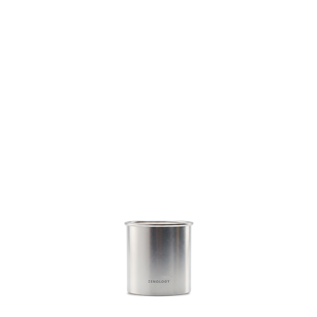 Front view of the Camellia Sinensis perfume candle in its aluminium container.