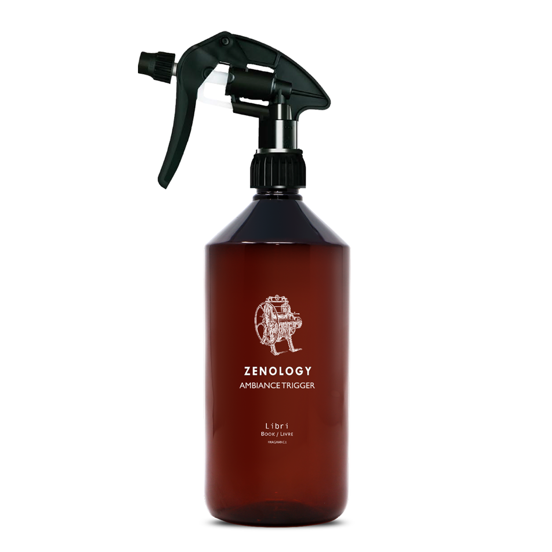 A large sized brown spray bottle labeled Zenology Ambiance Trigger Libri featuring an unique botanical illustration with a black spray nozzle.