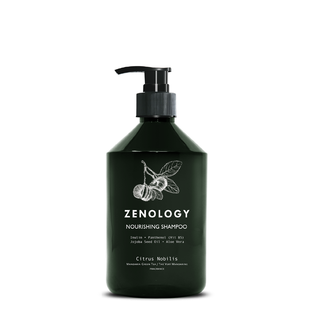 A green pump bottle labeled Zenology Nourishing Shampoo Citrus Nobilis featuring an unique botanical illustration and a black pump.