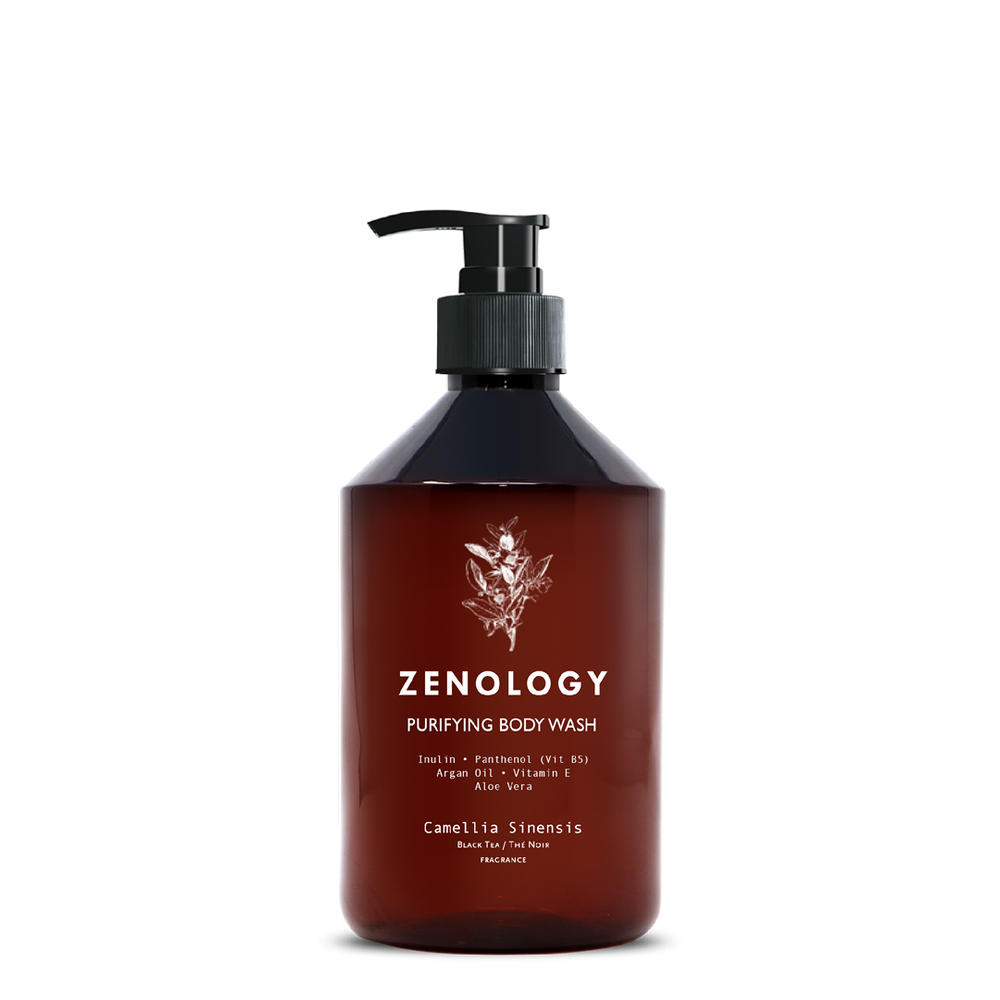 A brown pump bottle labeled Zenology Purifying Body Wash Camellia Sinensis featuring an unique botanical illustration and a black pump.