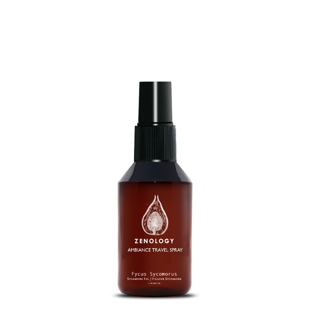 A small sized brown spray bottle labeled Zenology Ambiance Travel Spray Fycus Sycomorus featuring an unique botanical illustration with a black spray top.