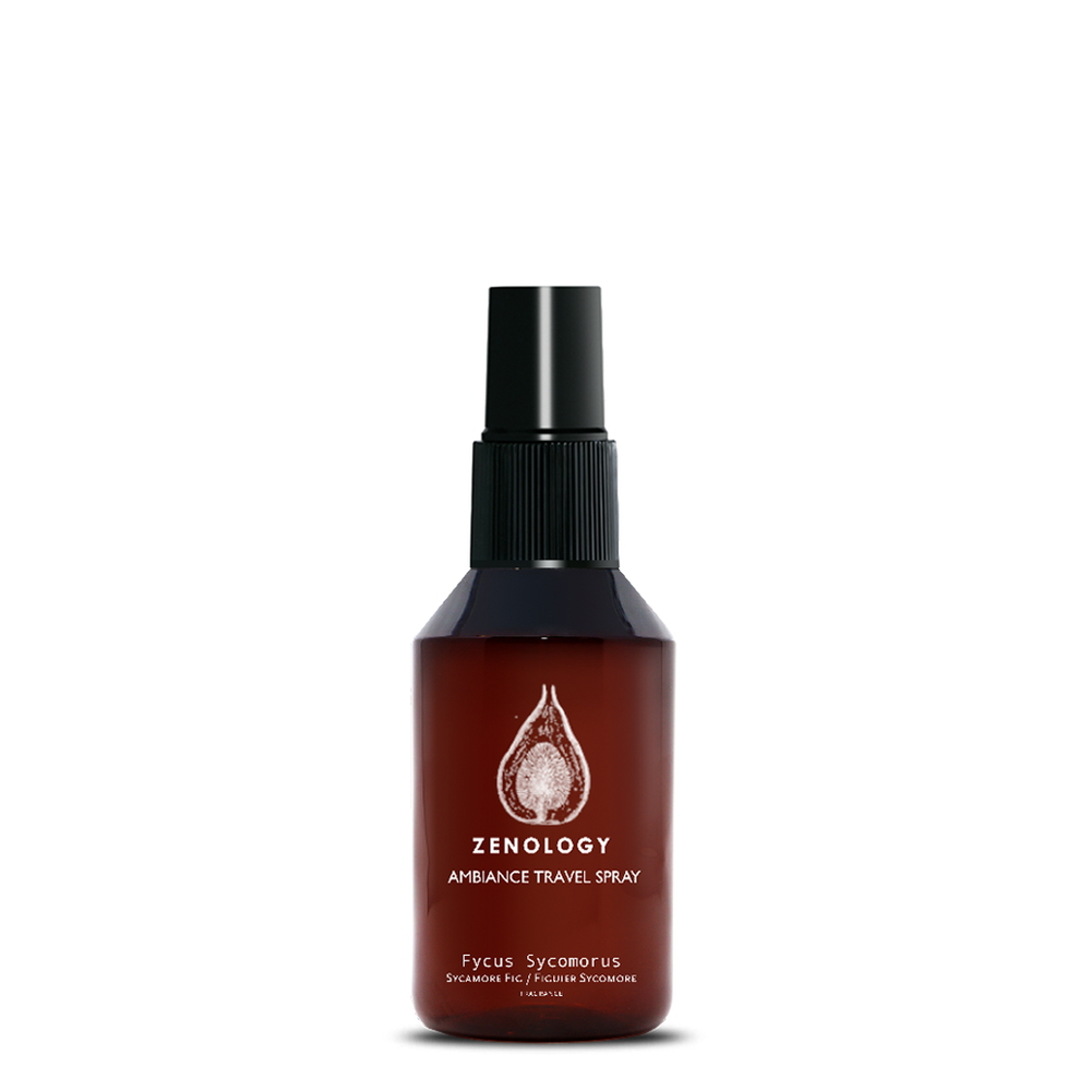 A small sized brown spray bottle labeled Zenology Ambiance Travel Spray Fycus Sycomorus featuring an unique botanical illustration with a black spray top.