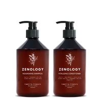 Two brown pump bottles with matching botanical graphics labeled Zenology Soothing Hand Wash Camellia Sinensis and Zenology Moisturizing Hand and Body Balm Camellia Sinensis.