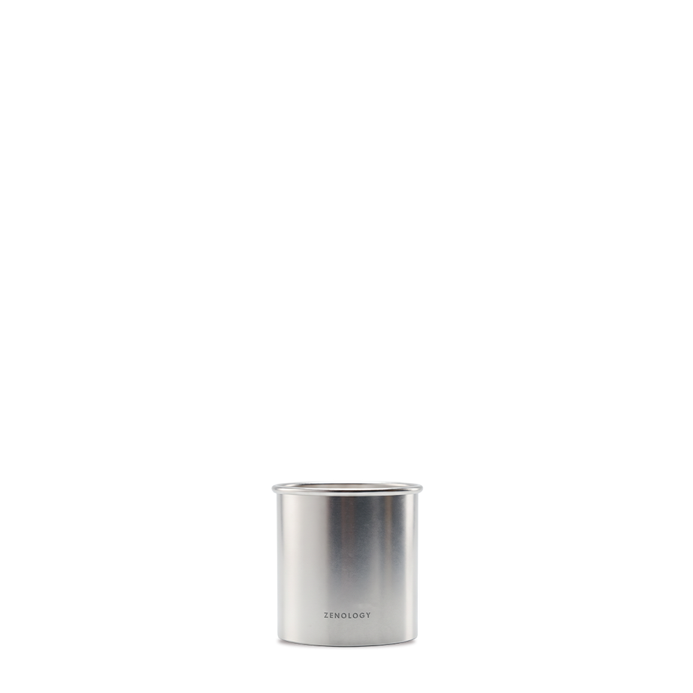Front view of the Camellia Sinensis perfume candle in its aluminium container.